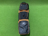 PowerBilt Black/Orange Travel Bag *Has rip on bottom*